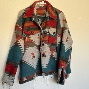 Warm and stylish shacket style top.